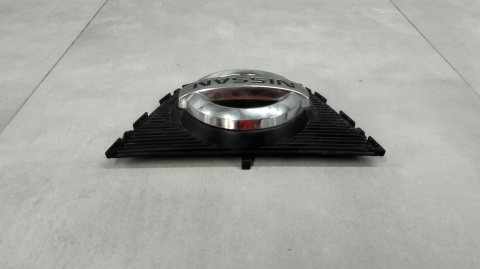 Znaczek emblemat logo grill przód NISSAN QASHQAI I J10 LIFT 09-
