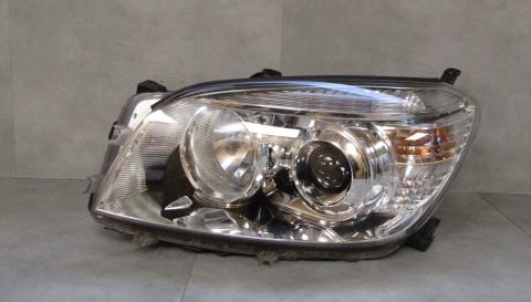 LAMPA PRZEDNIA TOYOTA RAV 4 RAV4 ZWYKŁA SOCZEWKA LEWA LH 05-08