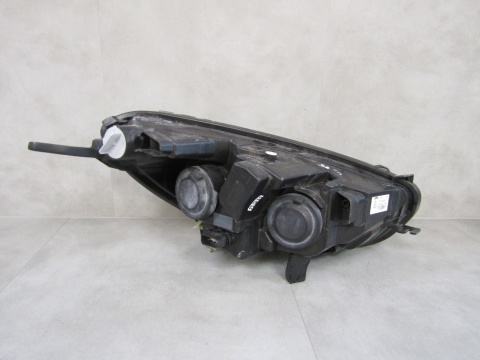 Lampa przód Ford Transit Courier ZWYKŁA 14- LH JT76 13W030 CD