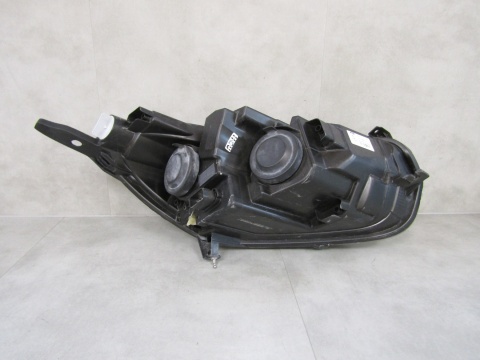 Lampa przód Ford Transit Courier ZWYKŁA 14- LH JT76 13W030 CD