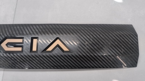 Blenda listwa nakładka klapy tył DACIA SPRING Lift 24- 908129501R