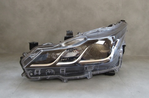LAMPA PRZÓD TOYOTA COROLLA E21 SEDAN ZWYKŁA SOCZEWKA LH 18- 81170-02T31-00