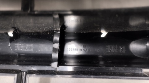 Kratka zderzaka środkowa przód SAAB 93 9-3 II LIFT 07-11 12765518