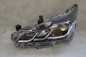 LAMPA PRZÓD TOYOTA COROLLA E21 SEDAN ZWYKŁA SOCZEWKA LH 18- 81150-02T31-00