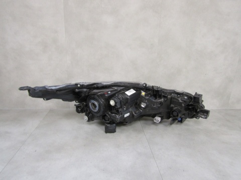 LAMPA PRZÓD TOYOTA COROLLA E21 SEDAN ZWYKŁA SOCZEWKA LH 18- 81150-02T31-00