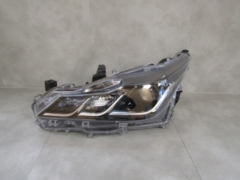 LAMPA PRZÓD TOYOTA COROLLA E21 SEDAN ZWYKŁA SOCZEWKA LH 18- 8115002T3100