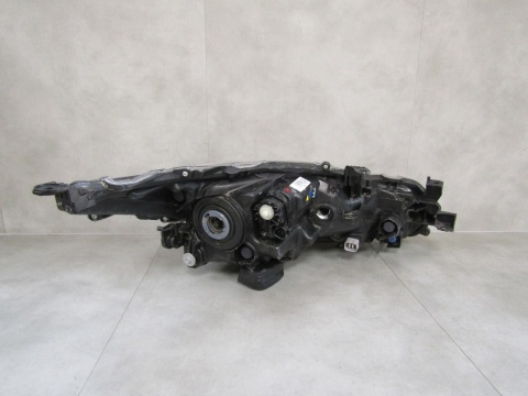 LAMPA PRZÓD TOYOTA COROLLA E21 SEDAN ZWYKŁA SOCZEWKA LH 18- 8115002T3100