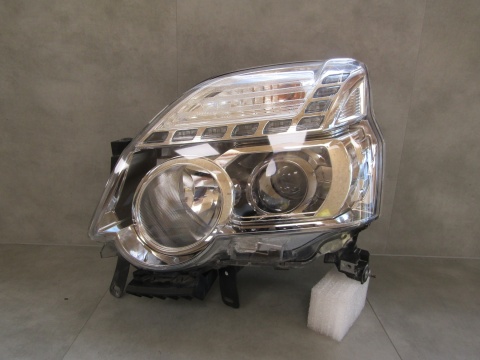 Lampa przód Nissan X Trail T31 LIFT ZWYKŁA SOCZEWKA 10-13 LH LEWA