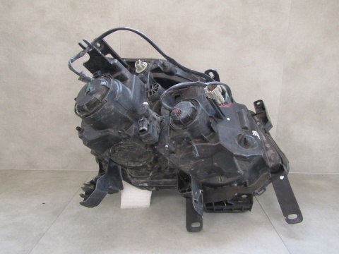 Lampa przód Nissan X Trail T31 LIFT ZWYKŁA SOCZEWKA 10-13 LH LEWA