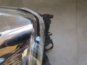 Lampa przód Nissan X Trail T31 LIFT ZWYKŁA SOCZEWKA 10-13 LH LEWA