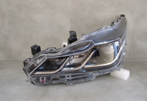 LAMPA PRZÓD TOYOTA COROLLA E21 SEDAN ZWYKŁA SOCZEWKA LH 18- 81150-02T31-00